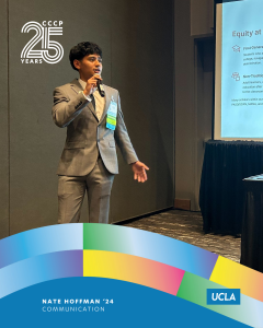 Nate Hoffman, UCLA Communication class of 2024, speaks into a microphone beside a presentation screen in a CCCP 25th anniversary–branded alumni graphic.