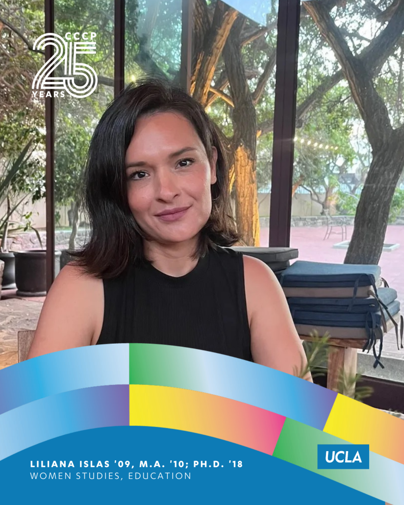 Liliana Islas, UCLA Women Studies class of 2009, M.A. class of 2010, and Ph.D. class of 2018, sits indoors near large windows overlooking trees.